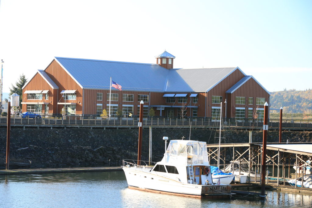 Boat and marina with a metal roof