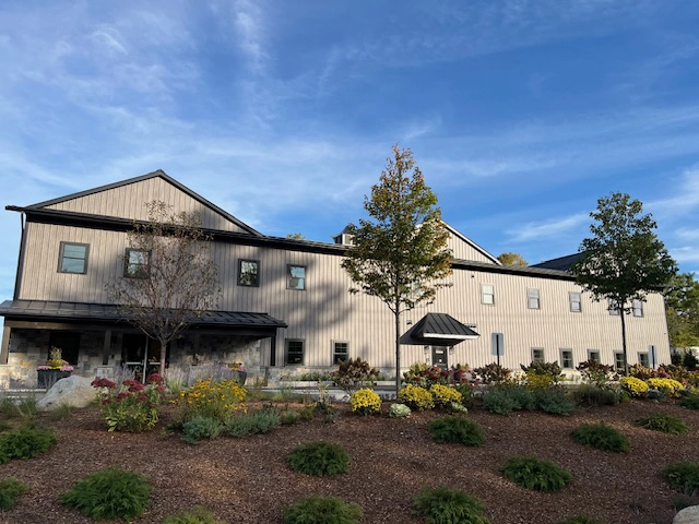 Matte Barnwood was selected for the siding on this solid core building in Moultonborough, NH. This finish offers aesthetics and durability.