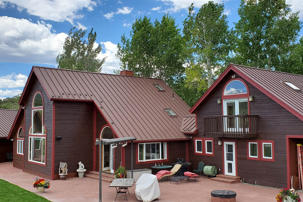 Steelscape's Rustic Rawhide finish on this residential home makes for a warm, inviting aesthetic look that will last for years.