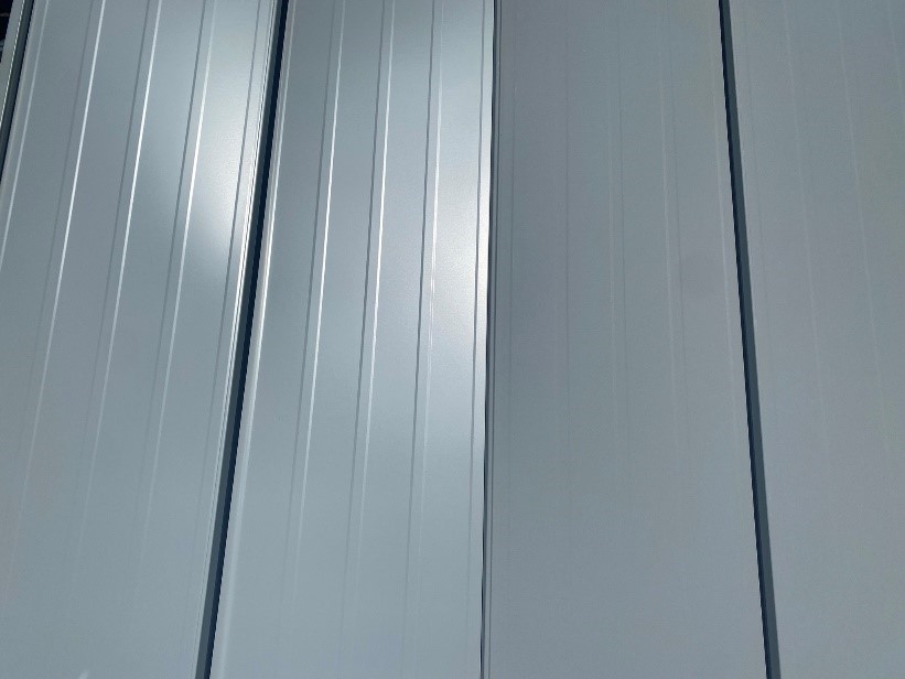 Natural Matte metal roofing and siding (right) offers enhanced aesthetic appeal with the same trusted performance as regular high performance painted metal (left