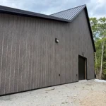 Matte Barnwood Barndominium in Maine featuring genuine Steelscape steel. Metal siding offers a matte finish for optimum realism and design.