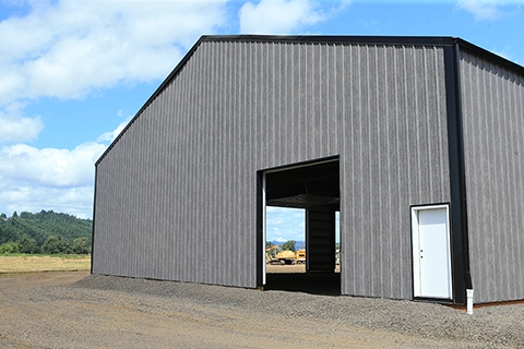 The North American Metals Expansion features genuine Steelscape steel in a Matte Barnwood print for siding and ZINCALUME® for roofing.