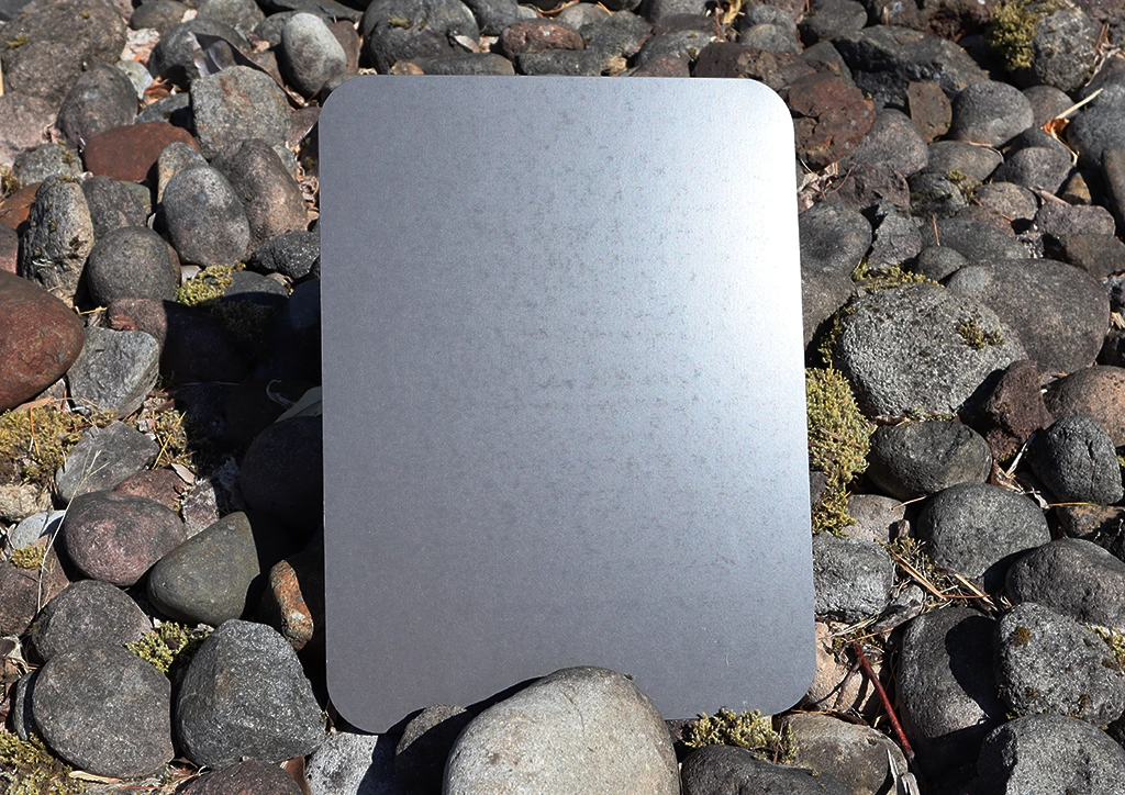 riverstone-flatlay Riverstone - A semi-translucent metallic finish designed to reveal the natural character of its ZINCALUME® substrate.